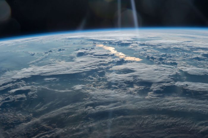 NASA, Beams of Light on a Golden Lake, image taken by the Expedition 47 crew on May 31, 2016, from the International Space Station looks from northwestern China on the bottom into eastern Kazakhstan courtesy of NASA